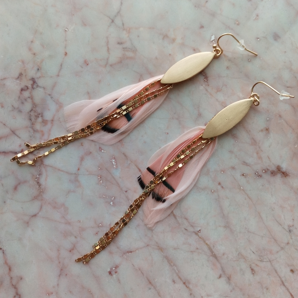Feather and gold tassel earrings